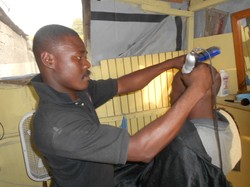 John Rony Teudy is one of the many Haitian business owner helped through the Service Chretien d’Haiti program partly funded by Presbyterian donations.